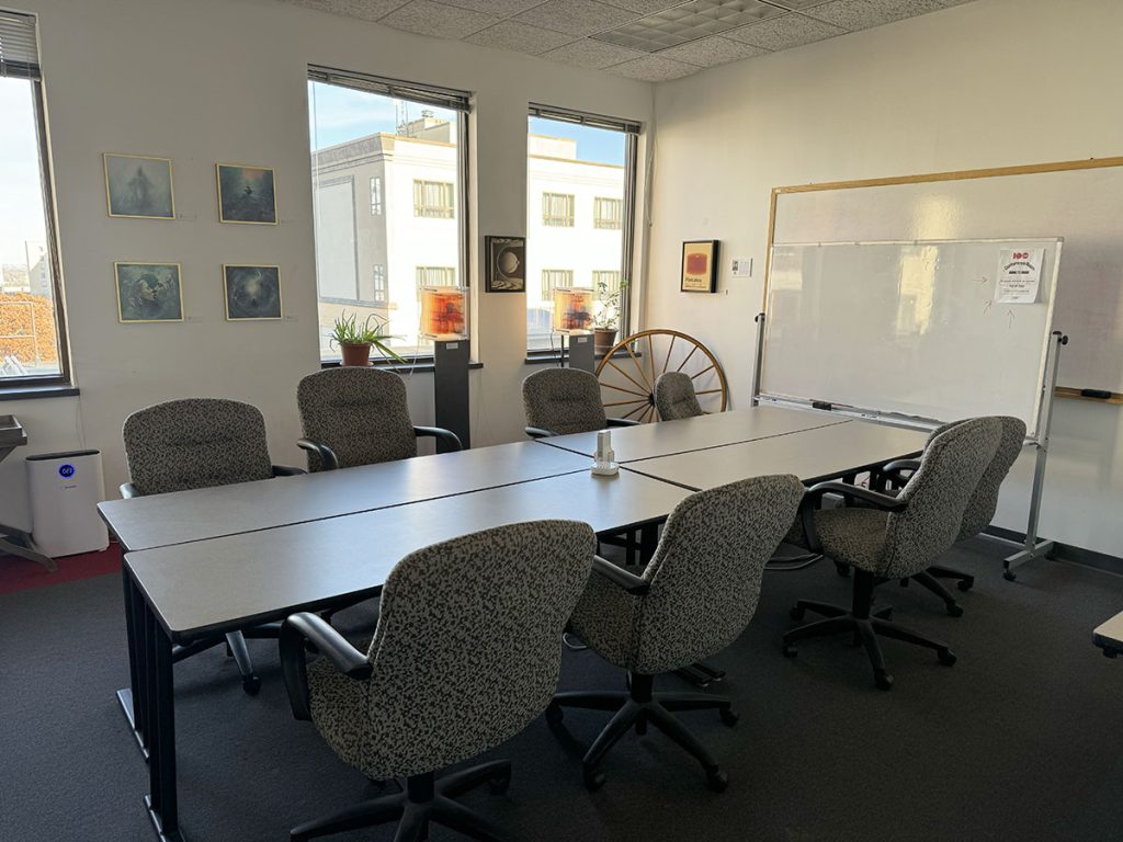 Medium conference room with natural light and a view of Madison's Capitol available for rent as a private office.